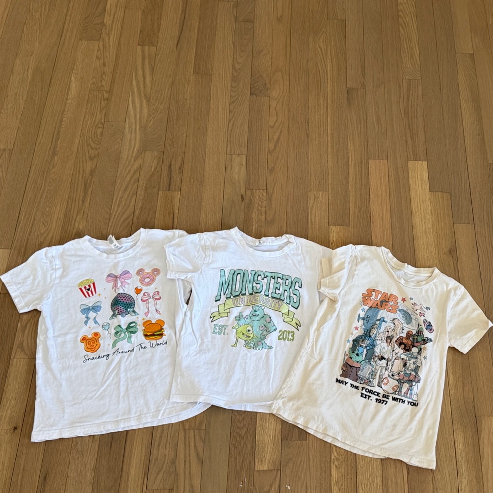 Three, size M Youth Disney theme park shirts